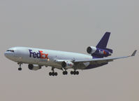 N522FE @ OMDB - Landing on DUBAI INTERNATIONAL Airport - by Willem Göebel