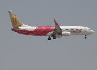 VT-AXZ @ OMDB - Landing on DUBAI INTERNATIONAL Airport - by Willem Göebel
