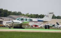 N5779K @ KOSH - Beech A55 - by Mark Pasqualino