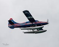 N63354 @ 5Z1 - Passing overhead of the Holland America Line Eurodam - by Terry Green