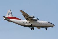EX-161 @ ORBI - British Gulf International Airlines An-12BP on short final to Rwy 33L, Baghdad International on October 20, 2005 - by Bob Morgan