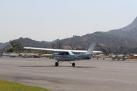 N704JH @ SZP - 1976 Cessna 150M, Continental O-200 100 Hp, taxi back - by Doug Robertson