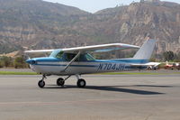 N704JH @ SZP - 1976 Cessna 150M, Continental O-200 100 Hp, taxi back - by Doug Robertson