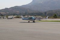 N704JH @ SZP - 1976 Cessna 150M, Continental O-200 100 Hp, landing roll Rwy 22 - by Doug Robertson