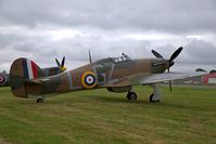 G-TWTD @ EGKB - Currently painted to represent Hurricane Mk.I P2921 ‘Blue Peter’ flown by Pete Brothers of 32 Squadron, Biggin Hill 1940 (echoed by replica at old gates). At Festival of Flight Biggin Hill 2018 - by Chris Holtby