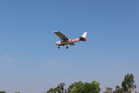 N9435U @ SZP - 1976 Cessna 150M, Continental O-200 100 Hp, another on final Rwy 22 shot - by Doug Robertson