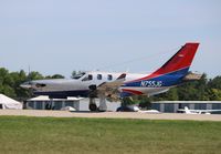 N755JG @ KOSH - Socata TBM 900 - by Mark Pasqualino