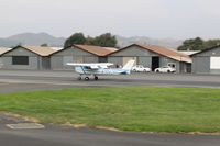 N704JH @ SZP - 1976 Cessna 150M, Continental O-200 100 Hp, landing roll Rwy 22 - by Doug Robertson