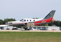 N81KF @ KOSH - Socata TBM 850 - by Mark Pasqualino