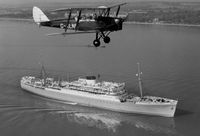 G-ALND - Presumably based at the Hamble AFS. Picture taken prior to 1962 over Southampton Water with the Union-Castle liner Durban Castle below - by Unknown