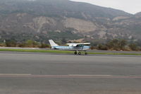 N704JH - 1976 Cessna 150M, Continental O-200 100 Hp, landing roll Rwy 22 - by Doug Robertson