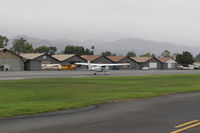 N704JH @ SZP - 1976 Cessna 150M, Continental 0-200 100 Hp, landing roll Rwy 04 - by Doug Robertson