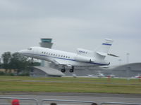 N240LG @ EGLF - Taking off from runway 24 at Farnborough airport EGLF - by Marc Mansbridge