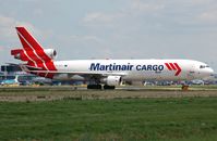 PH-MCY @ EHAM - Martinair MD11F taxying to its stand - by FerryPNL