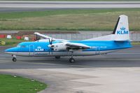 PH-LXP @ EDDL - KLC Fk50 arriving in DUS - by FerryPNL