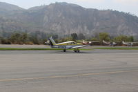N7787N @ SZP - 1969 Piper PA-28-180 CHEROKEE, Lycoming O&VO-360 180 Hp, landing roll Rwy 22 - by Doug Robertson