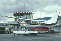 HZ-SAM @ LSZG - At Grenchen in old paint-scheme. The old airport-building behind. - by sparrow9