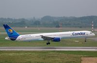 D-ABOK @ EDDL - Condor B753 landing in a grey DUS - by FerryPNL