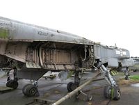 XZ107 @ EGVJ - Deteriorating rapidly outside in the Jaguar graveyard at ex-RAF Bentwaters, Suffolk - by Chris Holtby