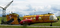 11310 @ CYQQ - Being reassembled for display at the Comox Air Force Museum - by S.S.