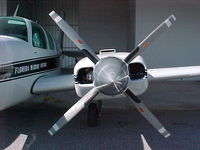 N6MP @ FMY - Baron N6MP in service with The Florida Marine Patrol - Fort Myers Page Field - by Fred Klohn