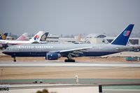 N796UA @ KLAX - UA B772 vacating the runway - by FerryPNL