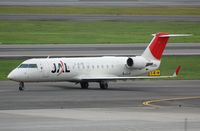 JA208J @ RJOO - Arrival of JAL CL200 - by FerryPNL