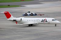 JA208J @ RJOO - J-Air opf JAL CL200 - by FerryPNL