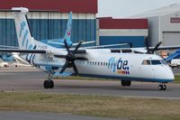 G-ECOB @ EGGW - Flybe DHC8 leaving LTN - by FerryPNL