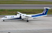 JA845A @ RJGG - ANA DHC8 passing - by FerryPNL