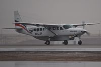 N247JP @ KBOI - Wet runway. - by Gerald Howard
