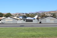 N704UT @ SZP - 1976 Cessna 150M, Continental O-200 100 Hp, takeoff climb Rwy 22 - by Doug Robertson