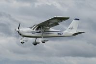 ZK-WTF @ NZNE - landing at north shore - by magnaman