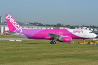 JA822P @ EDHI - Peach A320 under tow to the customer delivery center. German test reg D-AUBD taped over JA822P. - by FerryPNL