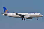 N452UA @ KMCO - On short final for r/w 18R