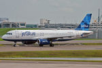 N624JB @ KMCO - Taxiing in after arrival - by Robert Kearney