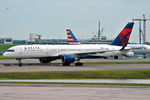 N688DL @ KMCO - Taxiing in after arrival