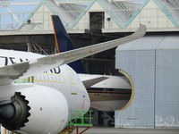 ZK-OKJ @ NZAA - morning after delivery into AKL - under Air NZ transition in hangar - by magnaman