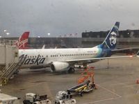 N585AS @ ORD - on apron in rain - by magnaman