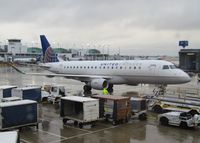 N739YX @ ORD - at chicago - arriving in rain storm - by magnaman