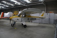 G-ARON @ EGBE - Seen parked inside hangar - by AirbusA320