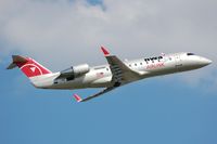 N8808H @ KDTW - Northwest Airlink CL200 taking-off. - by FerryPNL