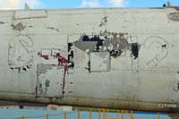 N116WG @ X6MO - Close up of the tail boom of N116WG showing the Class B markings G-17-12 and signs of patching. This shows the boom is a replacement having originally been on sister-ship N113WG c/n 012. - by Clive Pattle