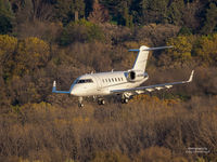 N605MM @ KMSP - Landing at MSP 30R over the Minnesota River Valled - by Greg Drawbaugh