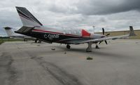 C-GWMF @ GRB - at Green Bay on grey day - by magnaman