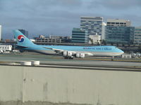 HL7617 @ LAX - just landed - viewed from inside terminal - by magnaman