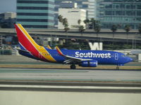 N497WN @ LAX - colourful airline - by magnaman