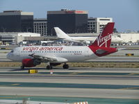N523VA @ LAX - old branson gets everywhere - by magnaman
