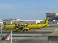 N662NK @ LAX - taxying out - bright scheme! - by magnaman