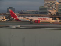 N786AV @ LAX - landing in dusk light through terminal window -bit fuzzy but good airline! - by magnaman